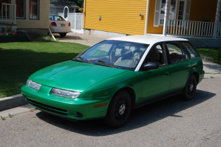 Illustration for article titled Found a picture of my custom Saturn manual wagon.